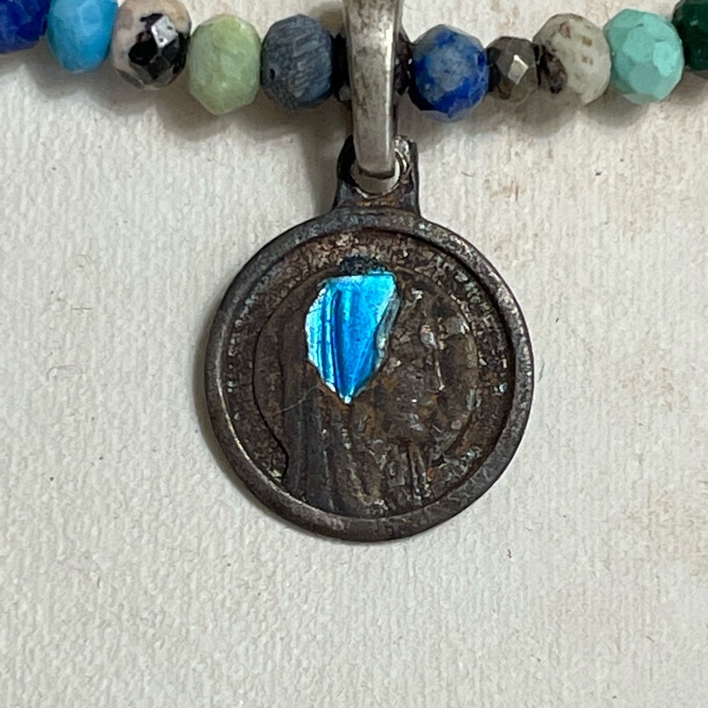 Mixed gemstones with Antique medallion